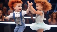 A boy and a girl enter the dance floor under “Footloose” and circle the judges’ heads